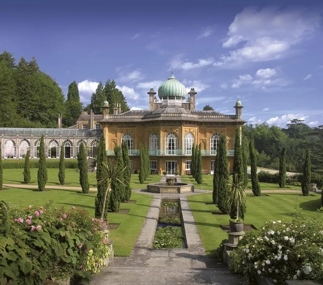 The south front of Sezincote House with its copper onion dome, orangery and formal Indian water garden