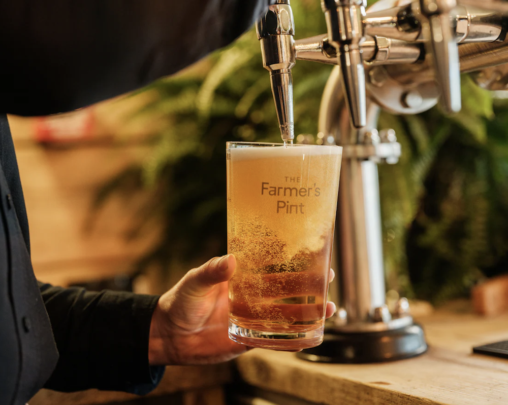 A Farmer's Pint being poured at the bar at The Farmer's Dog