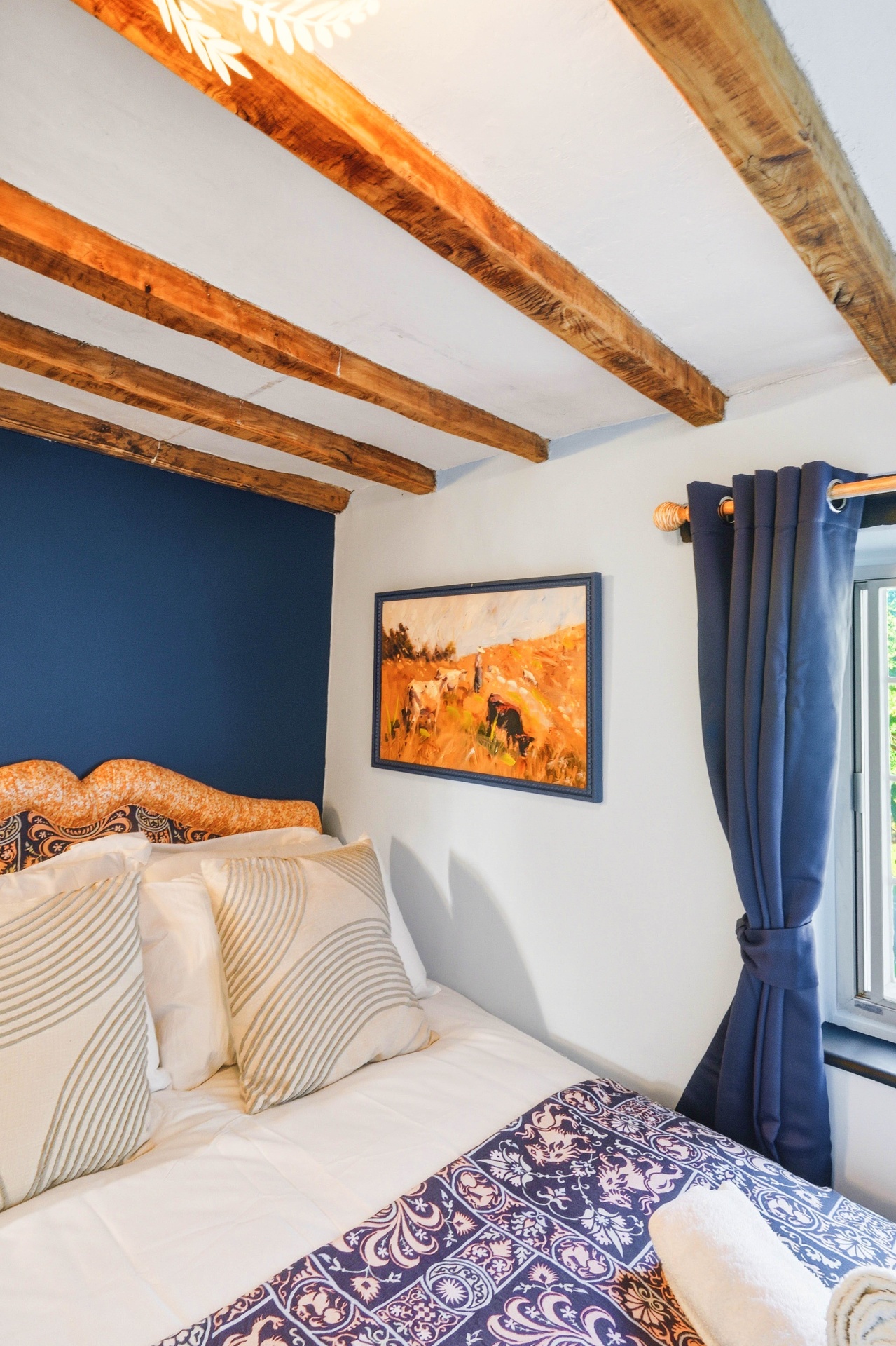 Bedroom Four detail with artwork and window